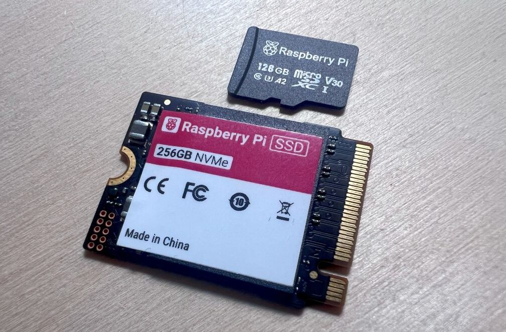 Official Raspberry Pi NVMe SSD and Raspberry Pi 128GB microSD Card side by side